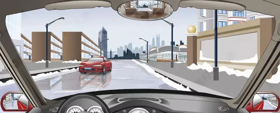 如图所示，冰雪天气条件下，驾驶机动车在结冰的道路上会车时，应…