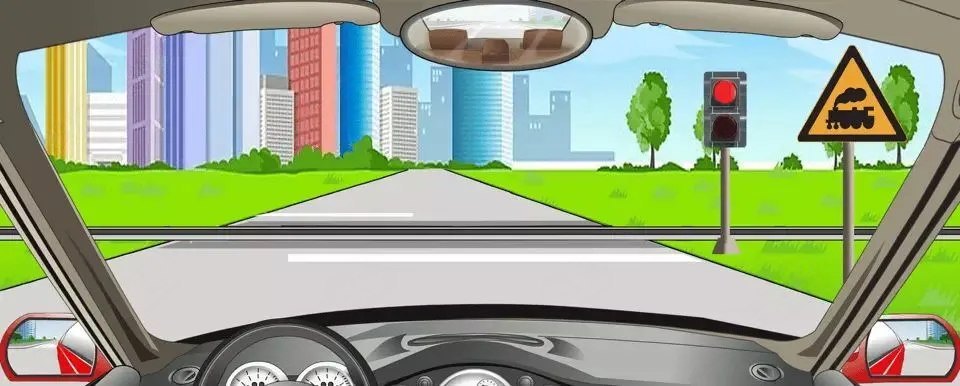 如图所示，在道路与铁路道口遇到一个红灯亮时要停车等待。