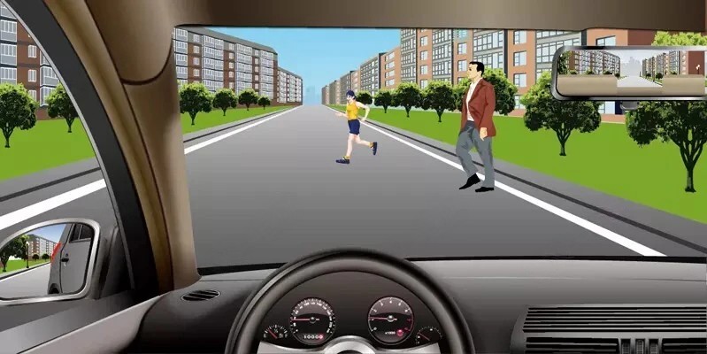 如图所示，行车中发现行人突然横过道路时，应减速避让。