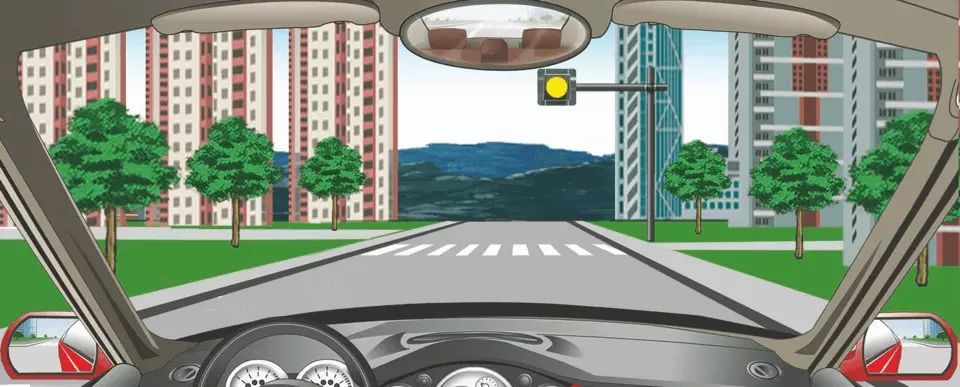 如图所示，驾驶机动车遇到这种信号灯不断闪烁时怎样行驶？