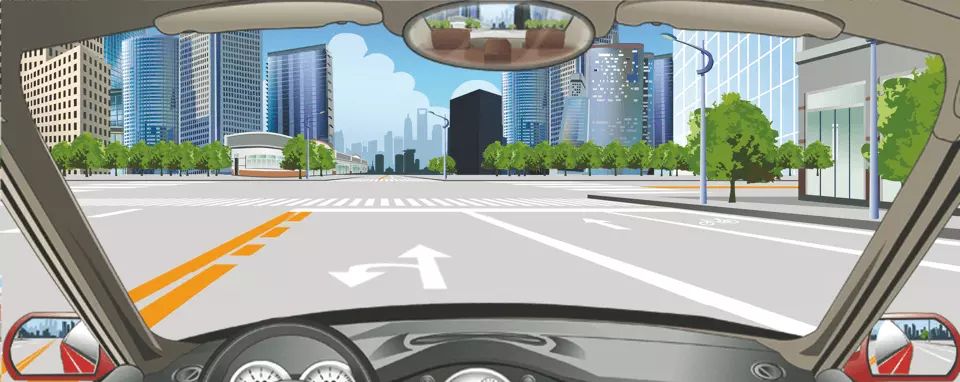 如图所示，该车道路面导向箭头指示前方路口仅能掉头。