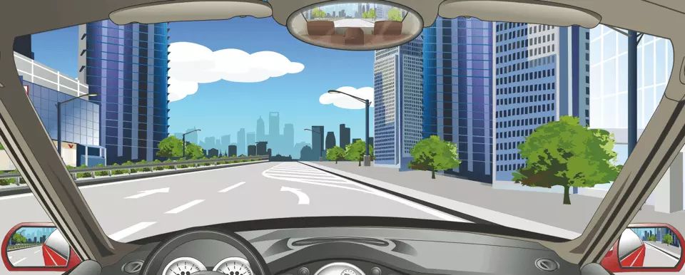 如图所示，该车道路面导向箭头提示前方道路需向左合流。